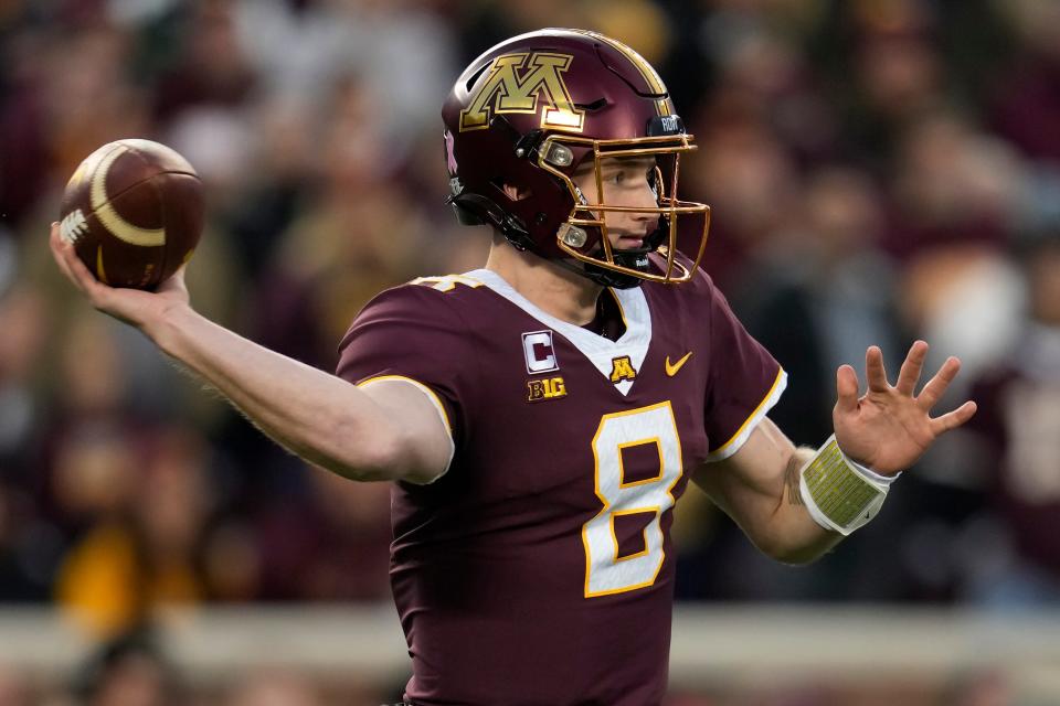 Minnesota quarterback Athan Kaliakmanis looks to pass the ball during the first half of an NCAA college football game against Michigan, Saturday, Oct. 7, 2023, in Minneapolis. (AP Photo/Abbie Parr)