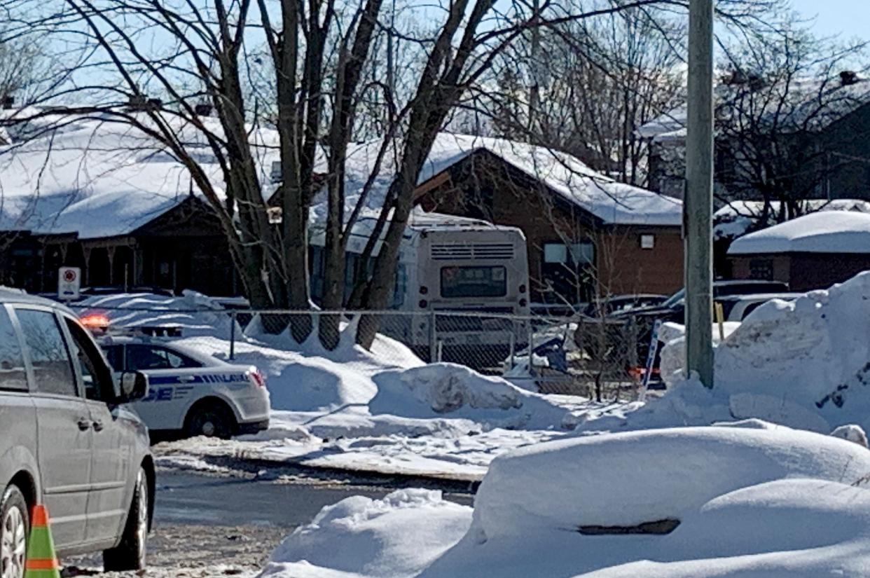 Laval, Canada, Police secure the scene where a city bus (C) crashed into a day care center on February 8, 2023 (AFP via Getty Images)
