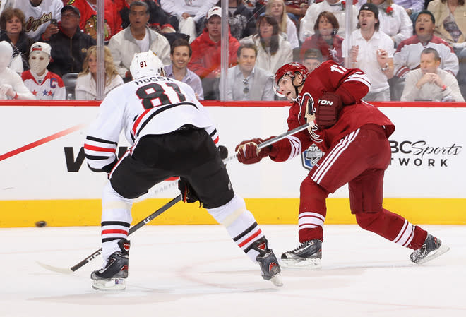   Radim Vrbata #17 Of The Phoenix Coyotes Shoots The Puck Past Marian Hossa #81 Of The Chicago Blackhawks In The Second Getty Images