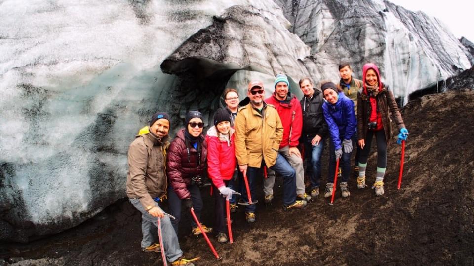 The Skift team near one of the caves in the Vatnajökull glacier in Iceland during a company retreat in 2014. Skift