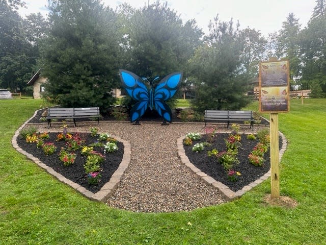 Plants, benches and butterfly artwork are among the features at the new Butterfly Garden at Silver Park in Alliance.