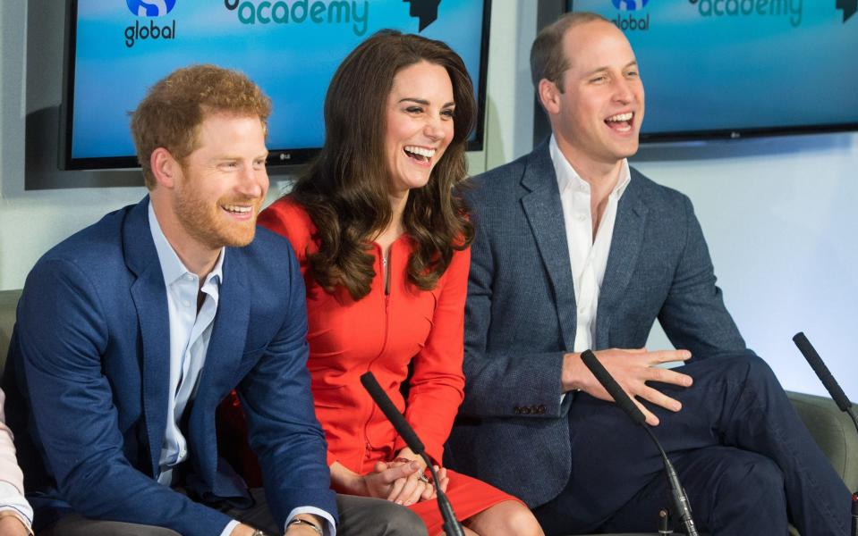 The Duke and Duchess of Cambridge and Prince Harry tour a TV studio during a visit to open the Global Academy  - Credit:  Dominic Lipinski