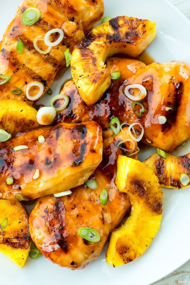 <p>This tropical grilled chicken is your new go-to summer dinner.</p><p>Get the <a href="https://www.delish.com/uk/cooking/recipes/a28826377/grilled-aloha-chicken-recipe/" rel="nofollow noopener" target="_blank" data-ylk="slk:Aloha Grilled Chicken;elm:context_link;itc:0;sec:content-canvas" class="link ">Aloha Grilled Chicken</a> recipe.</p>