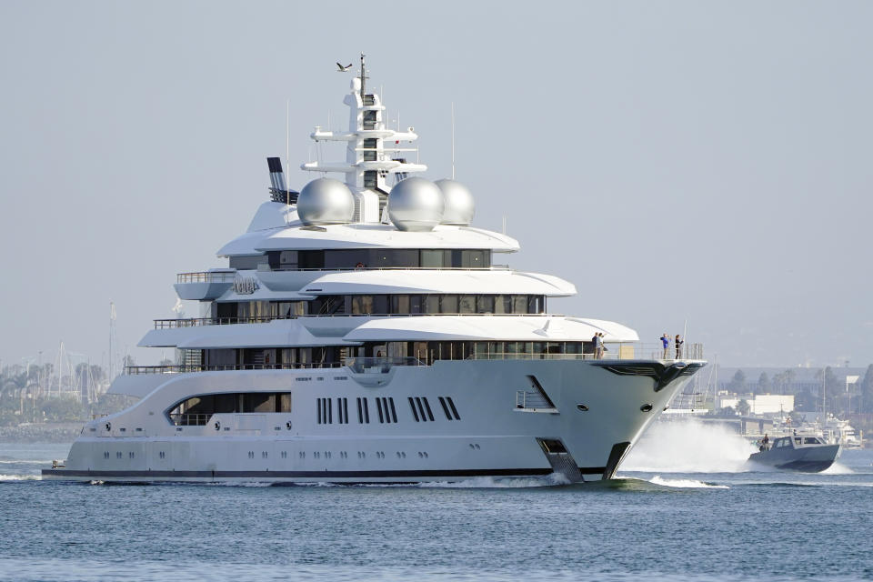 The super yacht Amadea sails into the San Diego Bay Monday, June 27, 2022, seen from Coronado, Calif. The $325 million superyacht seized by the United States from a sanctioned Russian oligarch arrived in San Diego Bay on Monday.(AP Photo/Gregory Bull)