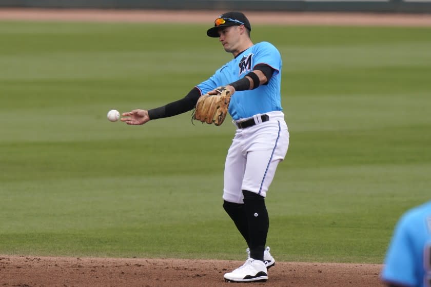 Miami Marlins shortstop Eddy Alvarez throws during the seventh inning.