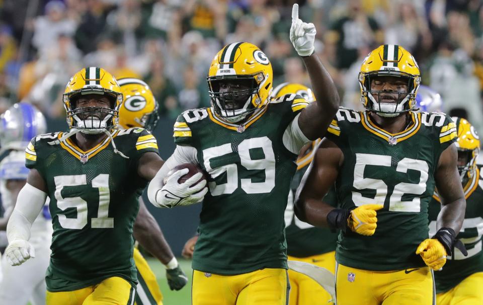 Green Bay Packers outside linebacker De'Vondre Campbell (59) celebrates his interception during the fourth quarter of their game Monday, September 20, 2021 at Lambeau Field in Green Bay, Wis. The Green Bay Packers beat the Detroit Lions 35-17.