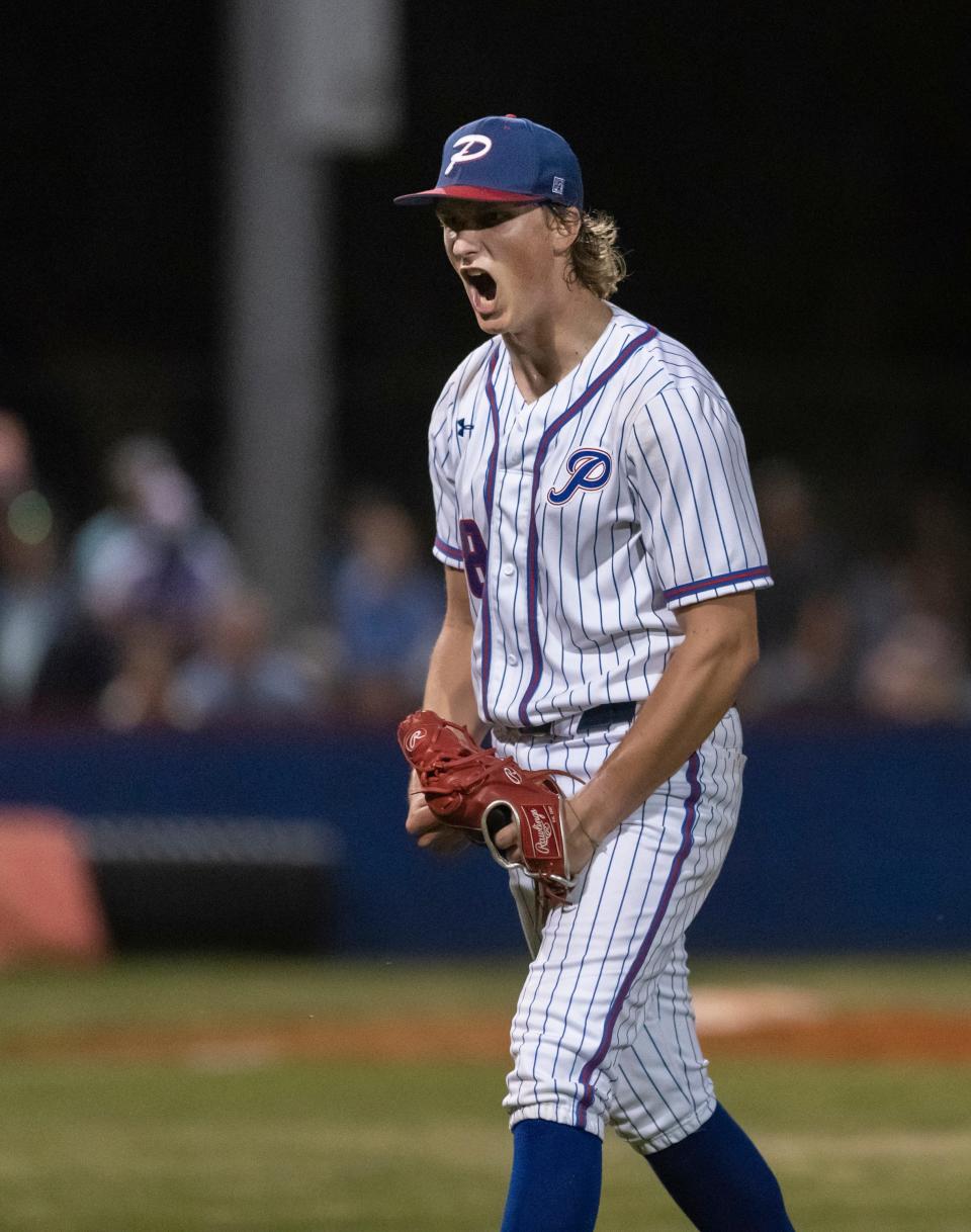 Walter Ford (18) celebrates striking out Jay Davis (4) to end the top of the fourth inning during the Tate vs Pace baseball game at Pace High School on Friday, April 15, 2022.