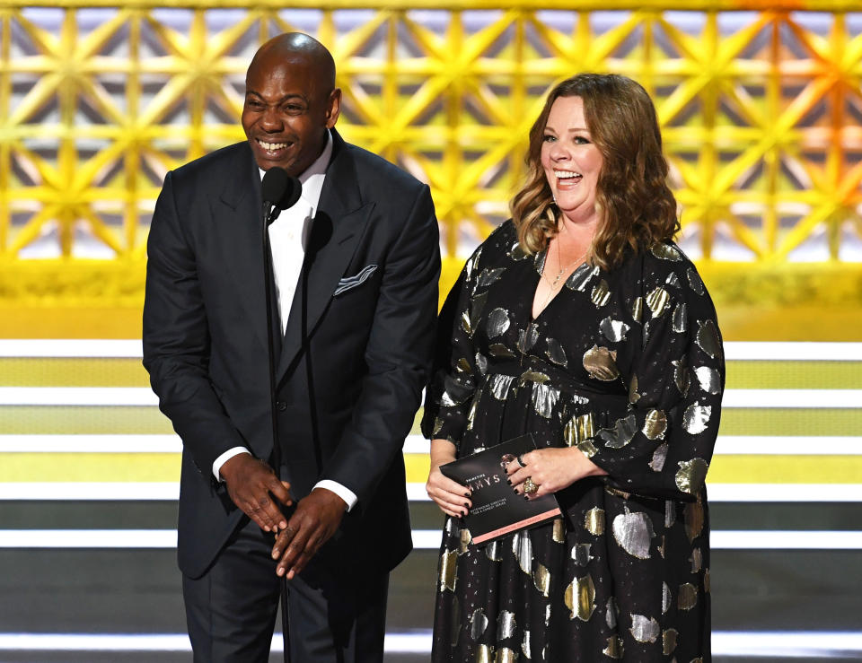 Comedian Dave Chappelle and actor Melissa McCarthy speak onstage during the 69th Annual Primetime Emmy Awards at Microsoft Theater on Sept. 17, 2017 in Los Angeles, California.&nbsp;