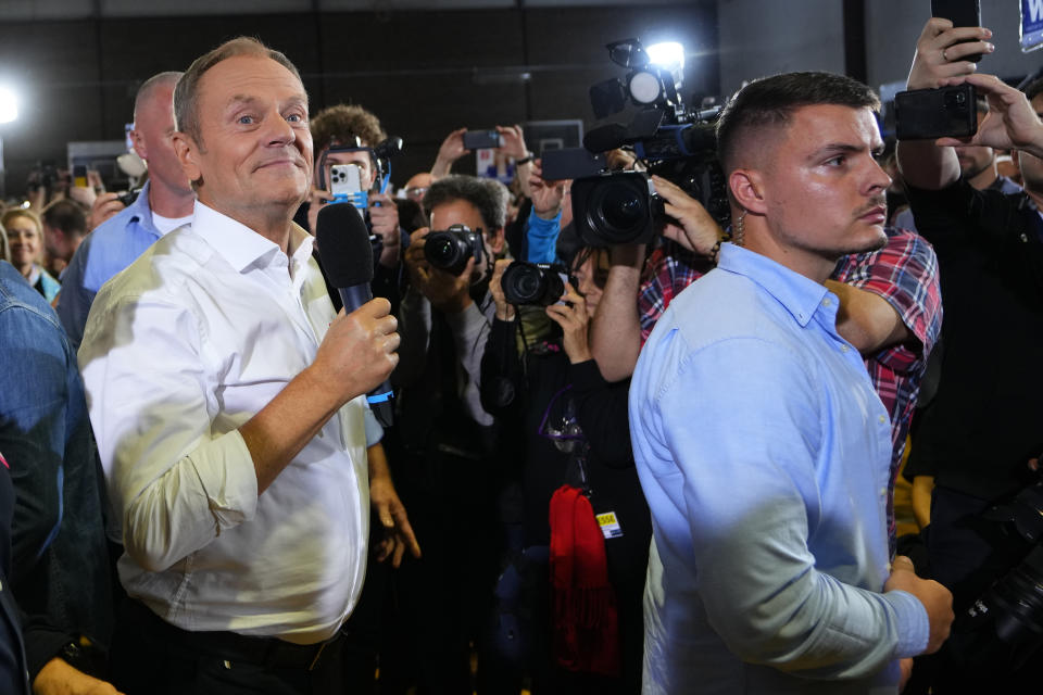 Poland's main opposition leader Donald Tusk arrives to address supporters during an election rally in Pruszkow, Poland, Friday, Oct. 13, 2023. Voters in Poland are heading into a divisive election Sunday, Oct. 15, 2023, that will chart the way forward for the European Union's fifth largest country by population size and its sixth biggest economy. Centrist coalition dominated by the Civic Platform party led by Donald Tusk, 66, a former Polish prime minister and former EU president, is the main opposition party. (AP Photo/Petr David Josek)