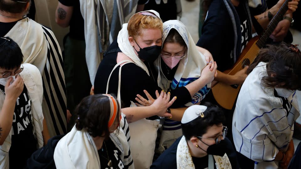 Jewish peace activists embrace during a rally on Capitol Hill for a ceasefire in the Israel-Gaza war. - Chip Somodevilla/Getty Images