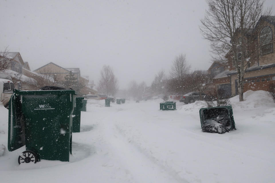 Strong wind gusts blew over trash cans in a neighborhood west of Flagstaff, Ariz., on Feb. 22, 2023.<span class="copyright">Felicia Fonseca—AP</span>