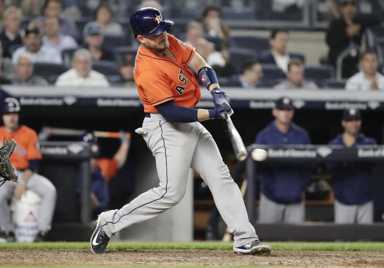 Houston Astros’ Max Stassi hits an RBI double during the ninth inning against the New York Yankees in a baseball game Wednesday, May 30, 2018, in New York. The Yankees won 5-3. (AP Photo/Frank Franklin II)