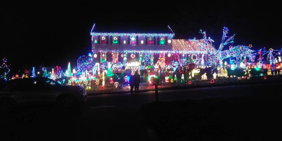 Christmas House of Armistice at 6097 Armistice Avenue NW in Jackson Township includes tens of thousands of lights illuminating the hillside and more than 200 decorations set to music.