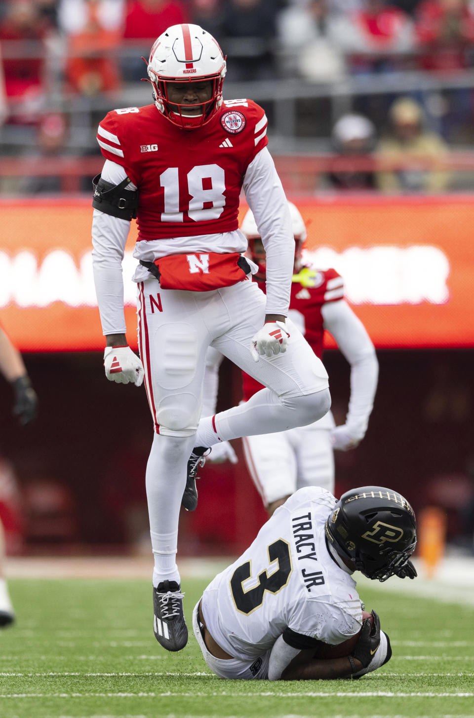 Nebraska's Princewill Umanmielen (18) celebrates after tackling Purdue's Tyrone Tracy Jr. (3) during the first half of an NCAA college football game Saturday, Oct. 28, 2023, in Lincoln, Neb. (AP Photo/Rebecca S. Gratz)