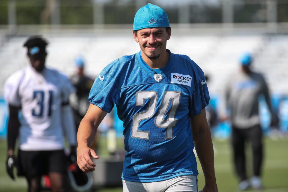 Detroit Lions place kicker Parker Romo walks off the field after practice during training camp at Detroit Lions Headquarters and Training Facility in Allen Park on Monday, July 24, 2023.