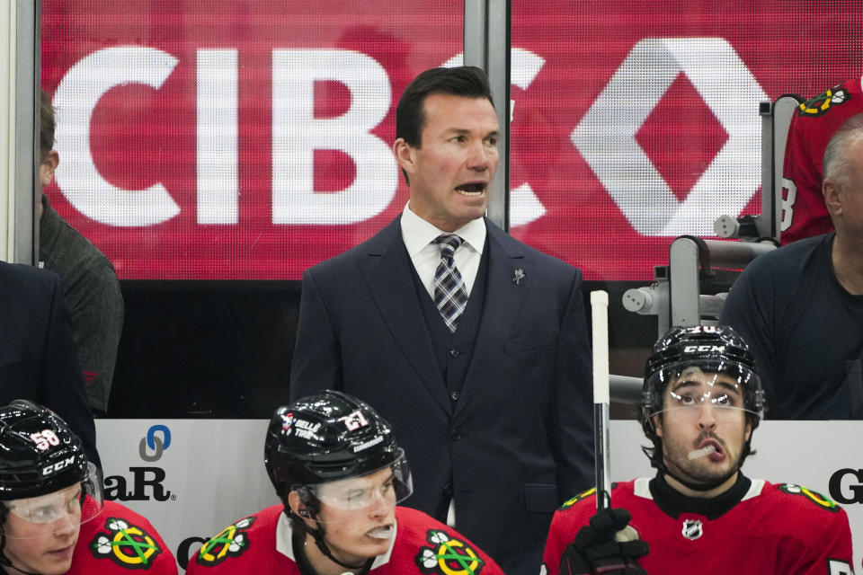 Chicago Blackhawks head coach Luke Richardson watches from the bench during the first period an NHL hockey game against the Nashville Predators, Tuesday, Dec. 5, 2023, in Chicago. (AP Photo/Erin Hooley)
