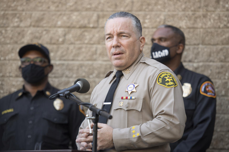 Los Angeles County Sheriff Alejandro Villanueva speaks during a press conference in front of Sheriff Department building in Lomita, Calif., Tuesday, Feb. 23, 2021, regarding golfer Tiger Woods' car accident. (AP Photo/Kyusung Gong)