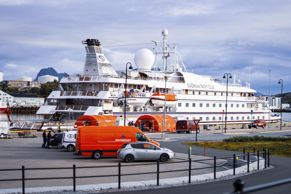 The cruise ship SeaDream 1 at the quay in Bodoe, Norway, Wednesday Aug. 5, 2020. The cruise ship with 123 passengers on board and a crew of 85 has docked in the Norwegian harbor of Bodoe but no one can disembark after a former passenger from Denmark tested positive for the coronavirus upon returning home. (Sondre Skjelvik/NTB Scanpix via AP)