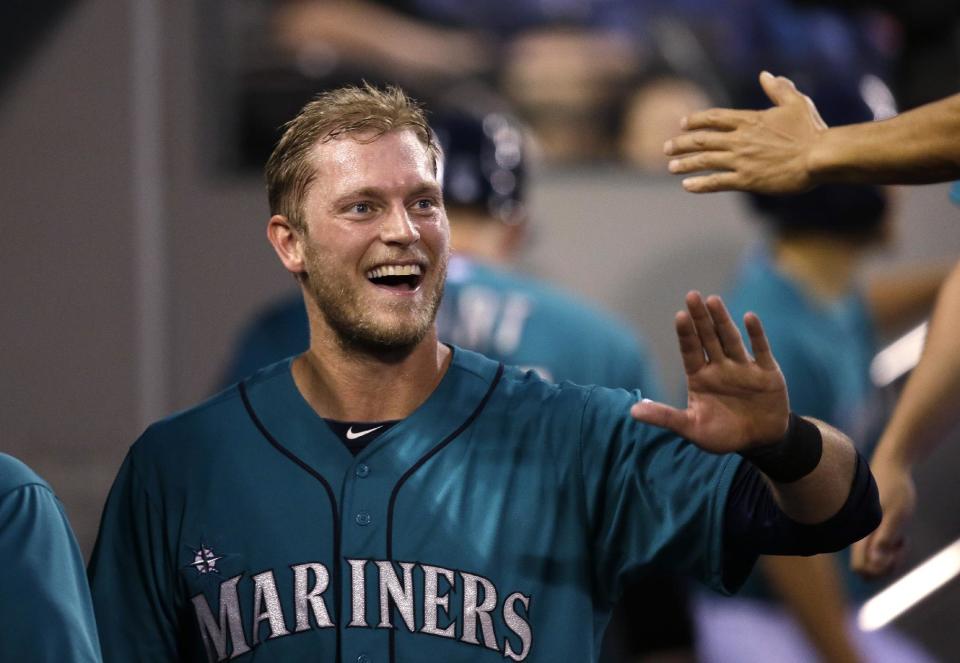 Michael Saunders was traded to the Blue Jays, bringing him home to Canada. (AP)