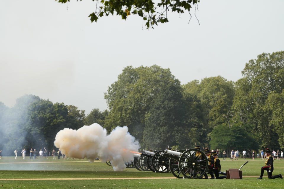 The King's Troop Royal Horse Artillery fire a 41 Gun Royal Salute supported by the Band of the Grenadier Guards, on the First anniversary of the death of Queen Elizabeth II, in Hyde Park, London, Friday, Sept. 8, 2023. With gun salutes and tolling bells, Britain is marking the first anniversary of the death of Queen Elizabeth II and the ascension of King Charles III, who remembered his mother as a symbol of stability during her 70-year reign. (AP Photo/Kirsty Wigglesworth)