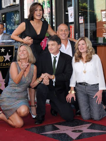 <p>Albert L. Ortega/Getty</p> Mariska Hargitay and siblings Mickey Hargitay Jr., Zoltan Hargitay and Jayne Marie Mansfield attend Mariska Hargitay's Star ceremony on The Hollywood Walk of Fame held on November 8, 2013.