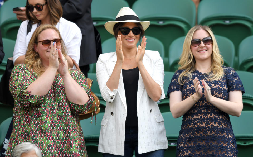 LONDON, ENGLAND - JULY 04:  Meghan, Duchess of Sussex (C) attends day 4 of the Wimbledon Tennis Championships at the All England Lawn Tennis and Croquet Club on July 04, 2019 in London, England. (Photo by Karwai Tang/Getty Images)