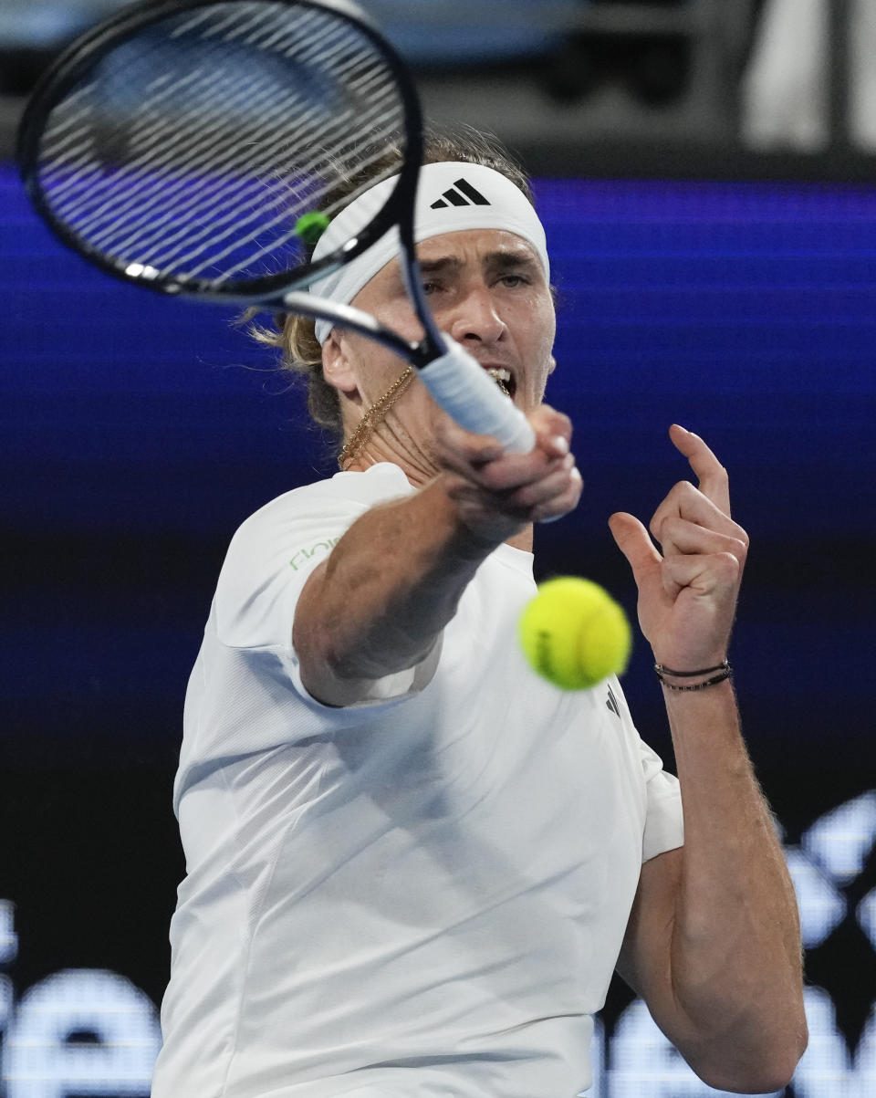 Germany's Alexander Zverev plays a forehand return to Stefanos Tsitsipas of Greece during their United Cup quarterfinal tennis match in Sydney, Australia, Friday, Jan. 5, 2024. (AP Photo/Mark Baker)