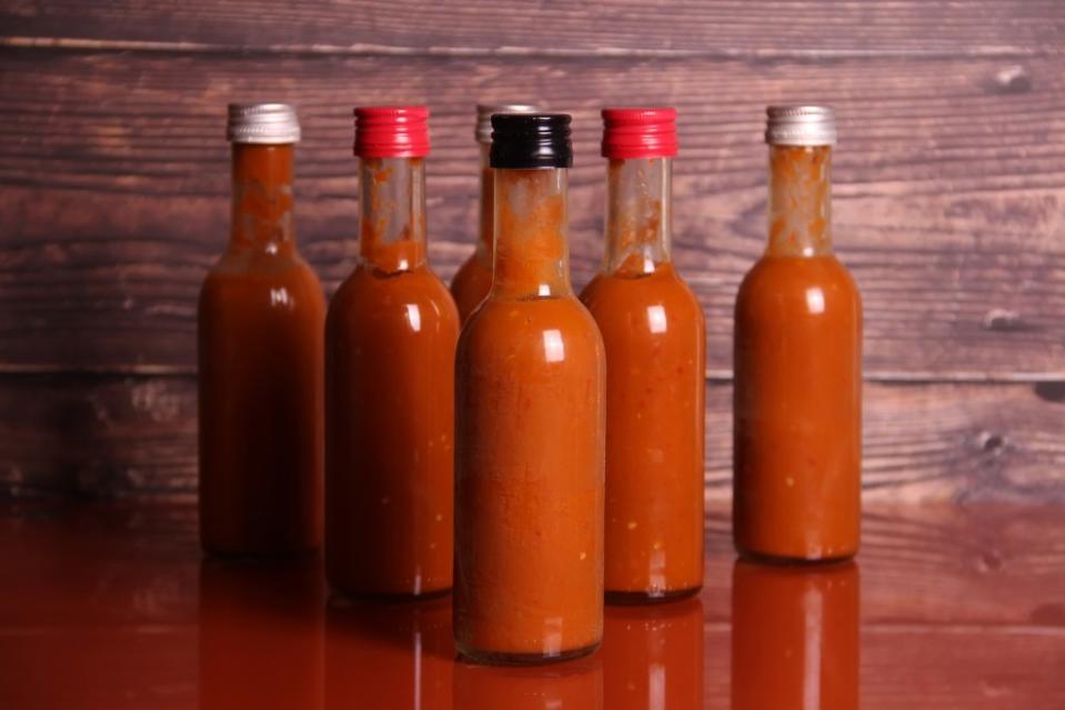 Hot sauce can aid digestion. kmfdm1 – stock.adobe.com