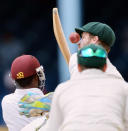 Australian wicketkeeper Peter Nevill (R) just misses a ball from West Indies batsman Narsingh Deonarine (L) during the third day of the second-of-three Test matches between Australia and West Indies April 17, 2012 at Queen's Park Oval in Port of Spain, Trinidad. AFP PHOTO/Stan HONDA (Photo credit should read STAN HONDA/AFP/Getty Images)