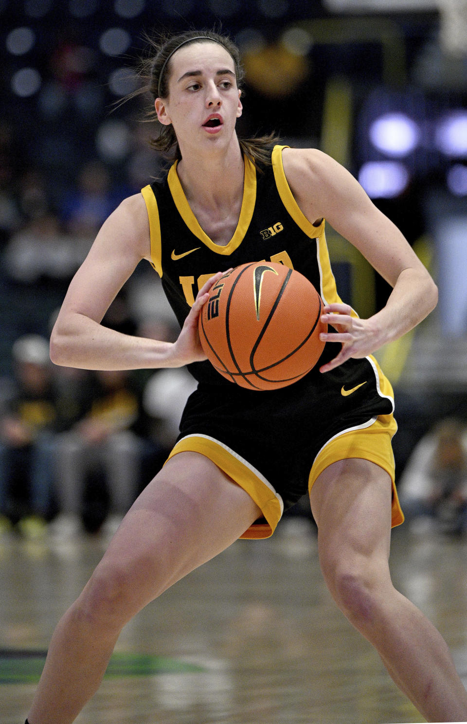 Iowa's Caitlin Clark looks pass the ball during the final game of the NCAA college basketball Gulf Coast Showcase, Sunday, Nov. 26, 2023, in Estero, Fla. (AP Photo/Chris Tilley)