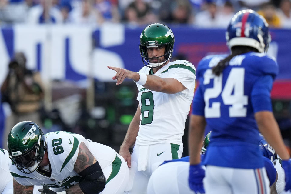 New York Jets quarterback Aaron Rodgers (8) calls out a play to his teammates during the first half of an NFL preseason football game against the New York Giants, Saturday, Aug. 26, 2023, in East Rutherford, N.J. (AP Photo/Frank Franklin II)