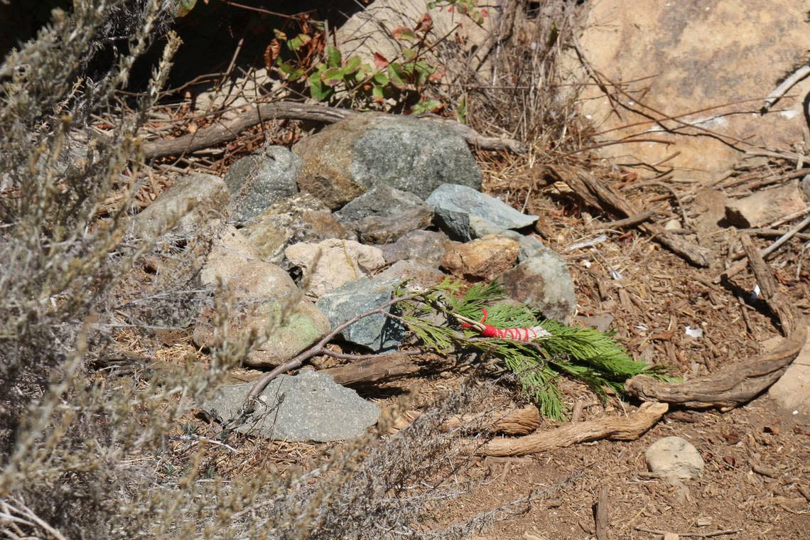 Stones from the Port San Luis breakwater were “reunified” with Morro Rock in a Northern Chumash ceremony on Aug. 20, 2022. Dozens of people formed a human line to pass rocks from a tomol boat to the base of the Morro Rock.