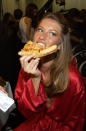 See? Even skinny supermodels do indulge in a piece of pizza every now and then.