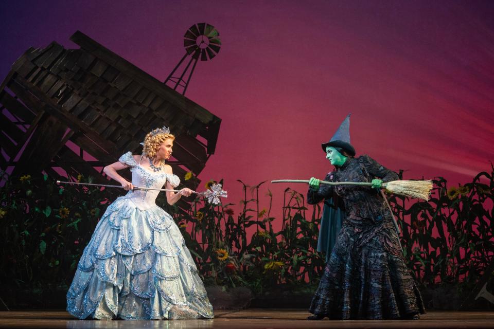 From left, Celia Hottenstein stars as Glinda and Olivia Valli as Elphaba in the national tour production of the musical "Wicked."