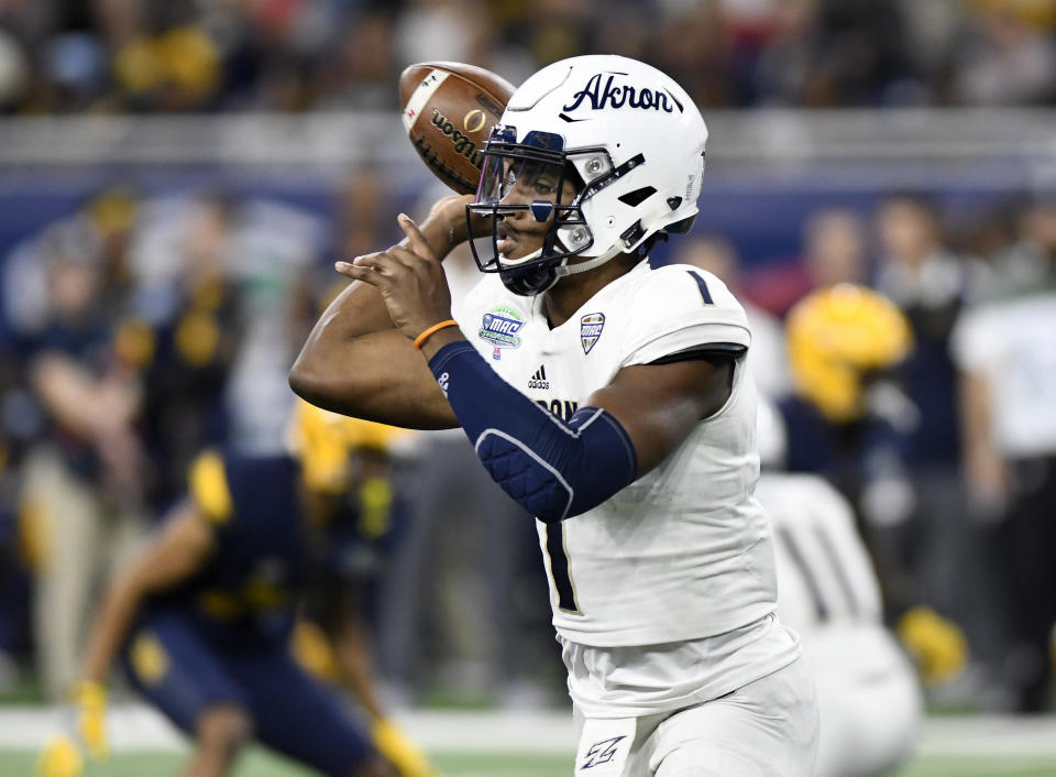 Akron Zips quarterback Kato Nelson (1) throws against the Toledo Rockets on Saturday, Dec. 2, 2017, in Detroit. Toledo defeated Akron 45-28. (AP)