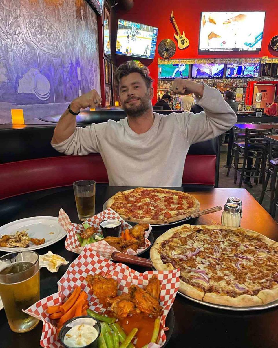 <p>"Just landed in LA and thought I'd kick things off with a super light healthy meal 💪💪" joked the <a href="https://people.com/tag/chris-hemsworth/" rel="nofollow noopener" target="_blank" data-ylk="slk:superhero actor;elm:context_link;itc:0;sec:content-canvas" class="link ">superhero actor</a> on a picture of him posing with his arms flexed in front of chicken wings, beer and pizzas. <a href="https://people.com/movies/shang-chis-simu-liu-says-marvel-movie-is-a-celebration-of-asianess/" rel="nofollow noopener" target="_blank" data-ylk="slk:Shang-Chi;elm:context_link;itc:0;sec:content-canvas" class="link "><em>Shang-Chi</em></a>'s <a href="https://www.instagram.com/simuliu/" rel="nofollow noopener" target="_blank" data-ylk="slk:Simu Liu;elm:context_link;itc:0;sec:content-canvas" class="link ">Simu Liu</a>'s took to the comments to convince Hemsworth to step outside the (pizza) box next time: "Bruh let me take you to KBBQ," wrote Liu.</p>