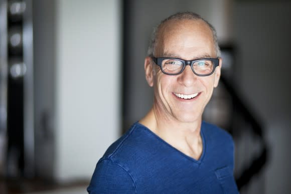 Smiling older man wearing glasses