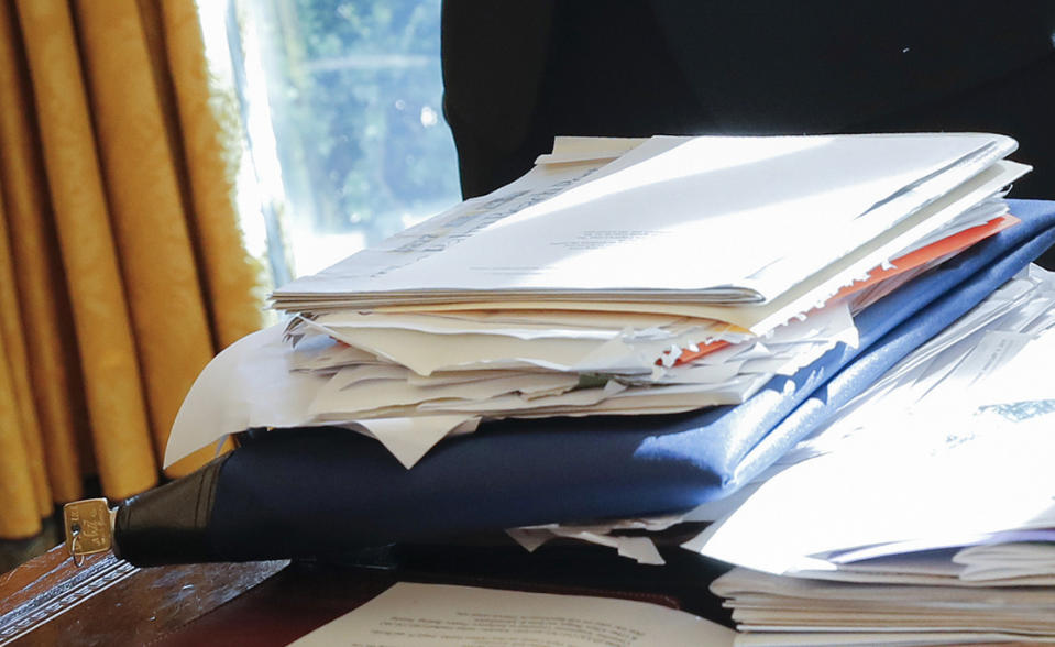 FILE - A lockbag is visible on President Donald Trump's desk during a meeting with Intel CEO Brian Krzanich in the Oval Office of the White House in Washington, Feb. 8, 2017. Sen. Martin Heinrich, D-N.M., all but warned of Trump's handling of sensitive documents early in the then-president’s term. “Never leave a key in a classified lockbag in the presence of non-cleared people. #Classified101,” tweeted Heinrich, a member of the Intelligence Committee, days after the February 2017 incident. (AP Photo/Pablo Martinez Monsivais, File)