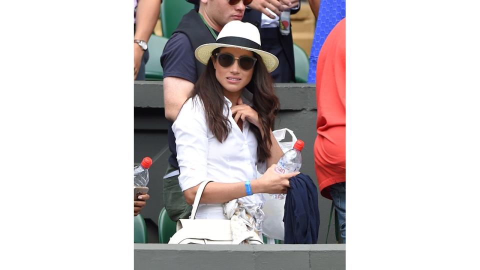 Meghan in a white shirt at Wimbledon in 2016