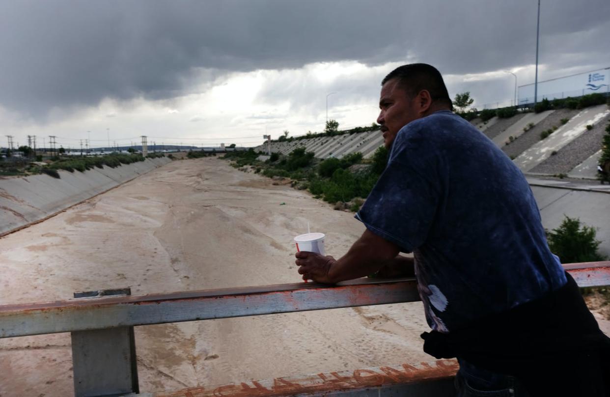 <span class="caption">Drought in Navajo Nation. Indigenous people around the world are dealing with many environmental problems, such as access to water.</span> <span class="attribution"><a class="link " href="https://www.gettyimages.com/detail/news-photo/man-overlooks-a-dry-river-bed-on-june-04-2019-in-gallup-new-news-photo/1153762258" rel="nofollow noopener" target="_blank" data-ylk="slk:Spencer Platt/Getty Images News;elm:context_link;itc:0;sec:content-canvas">Spencer Platt/Getty Images News</a></span>