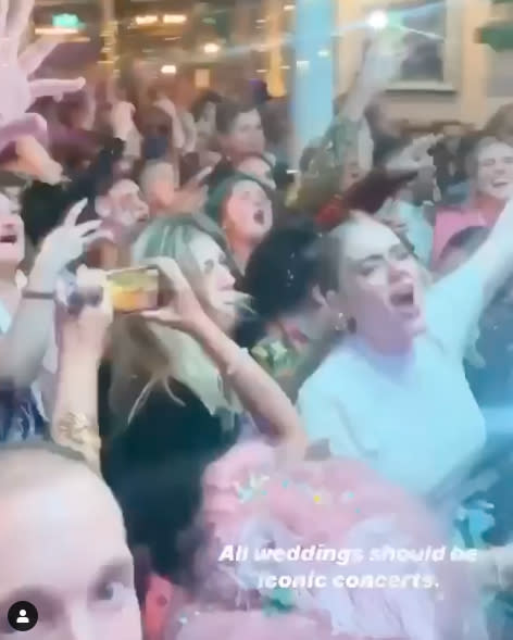 Blurry photo shows Adele singing in crowd to Florence Welsh at friend's wedding