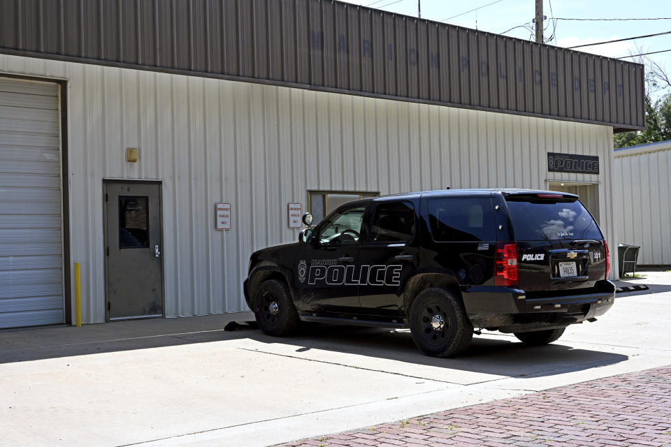 A police vehicle parked outside the Marion Police Department.