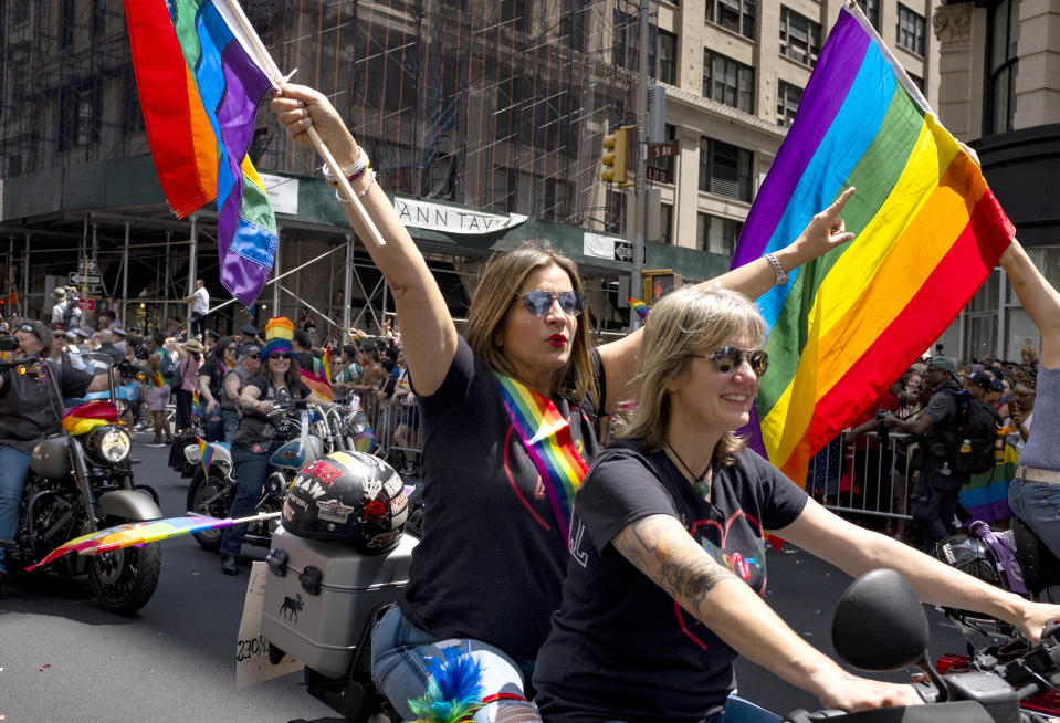 Participants on motorcycles roll along 5th Ave during the LBGTQ Pride march Sunday, June 30, 2019, in New York. (AP Photo/Craig Ruttle)