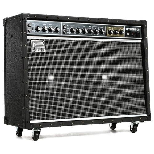 silver and black amp with wheels