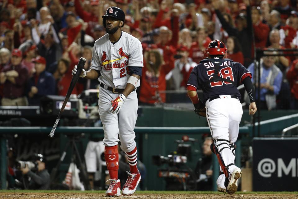 St. Louis Cardinals' Dexter Fowler reacts after striking out during the seventh inning of Game 3 of the baseball National League Championship Series against the Washington Nationals Monday, Oct. 14, 2019, in Washington. (AP Photo/Patrick Semansky)