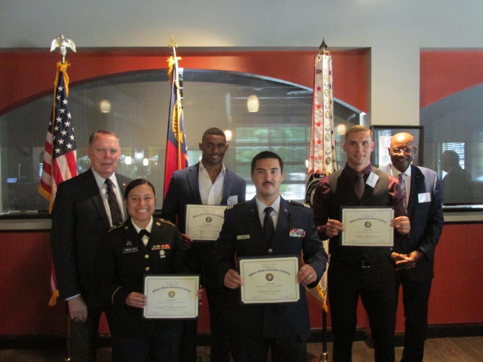 The Cape Fear Chapter of the Military Officers Association of America awarded scholarships to ROTC cadets during a May 6, 2022, ceremony. Recipients shown with Cape Fear MOAA President retired Maj. Richard Underwood and keynote speaker retired Col. Don Porter are Jasmine Thompson-Yanes, David Hudson, Andrei Fennimore and Marquize Woodson.