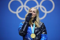 <p>Gold medalist Stina Nilsson of Sweden reacts during the medal ceremony for the Cross-Country Ladies’ Sprint Classic. (Getty) </p>