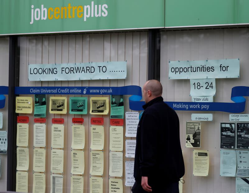 A man walks past a job centre following the outbreak of the coronavirus disease (COVID-19), in Manchester