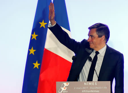 Francois Fillon, former French prime minister, member of the Republicans political party and 2017 presidential election candidate of the French centre-right, attends a political rally in Nimes, France March 2, 2017. REUTERS/Jean-Paul Pelissier