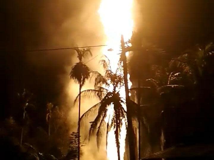 Illegal oil well in Indonesia bursts into flames killing at least 18 people